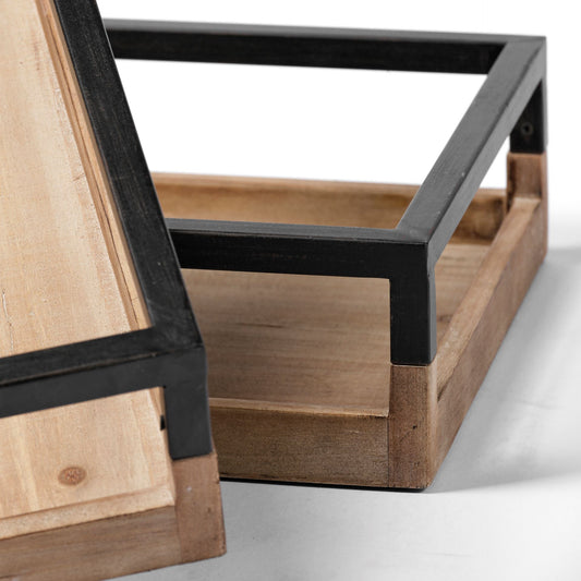 Wooden trays with black metal frames on a white background