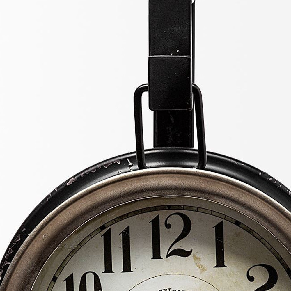 Close-up of a clock with a white face and black numbers on a white background