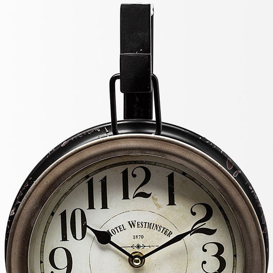 Vintage-style clock with 'Hotel Westminster' branding on a white background