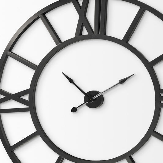 Black clock face with Roman numeral hour markers on a white background