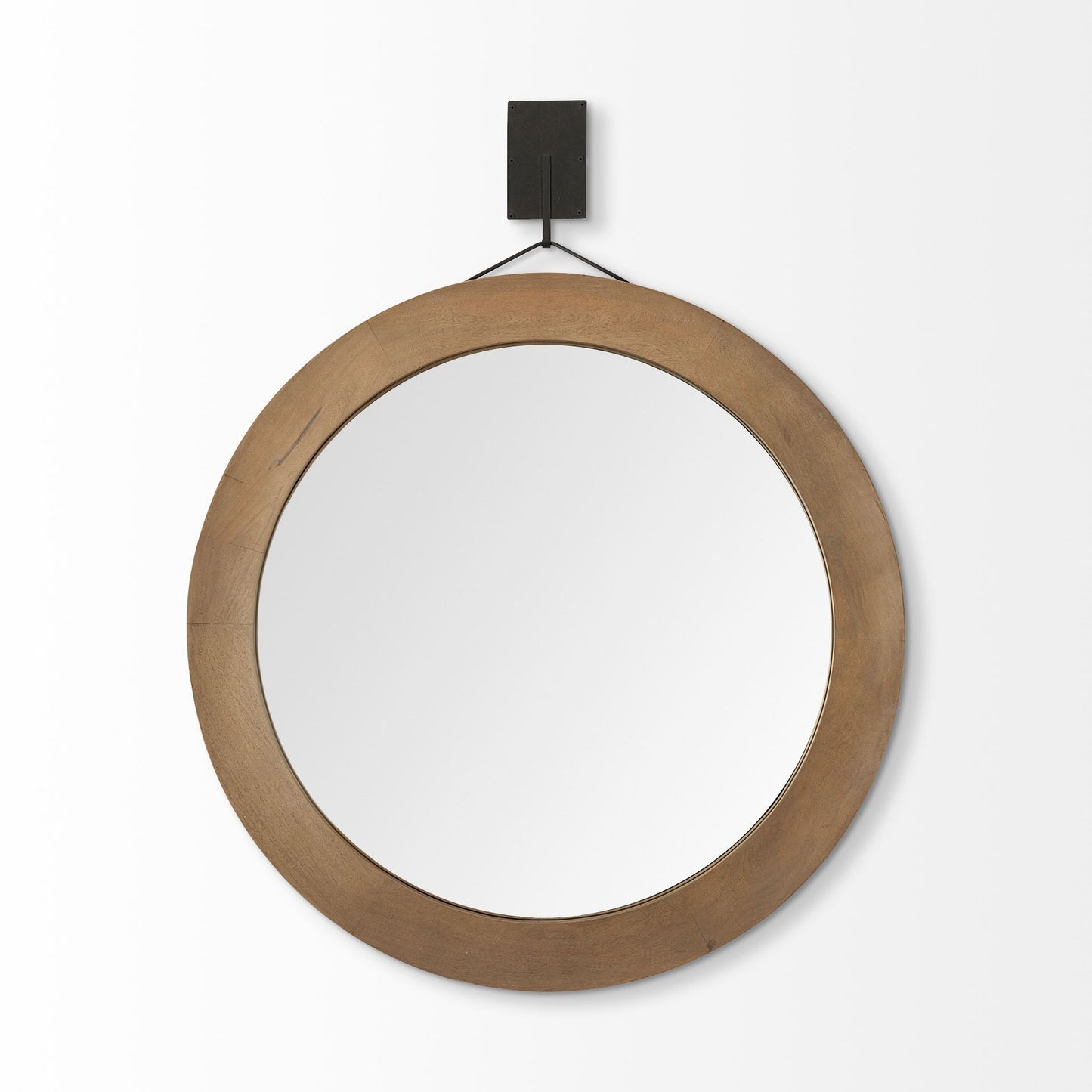 Round wooden mirror with a black hook on a white background