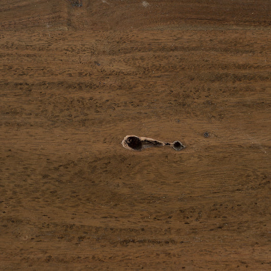 Close-up of a wooden surface with a knot