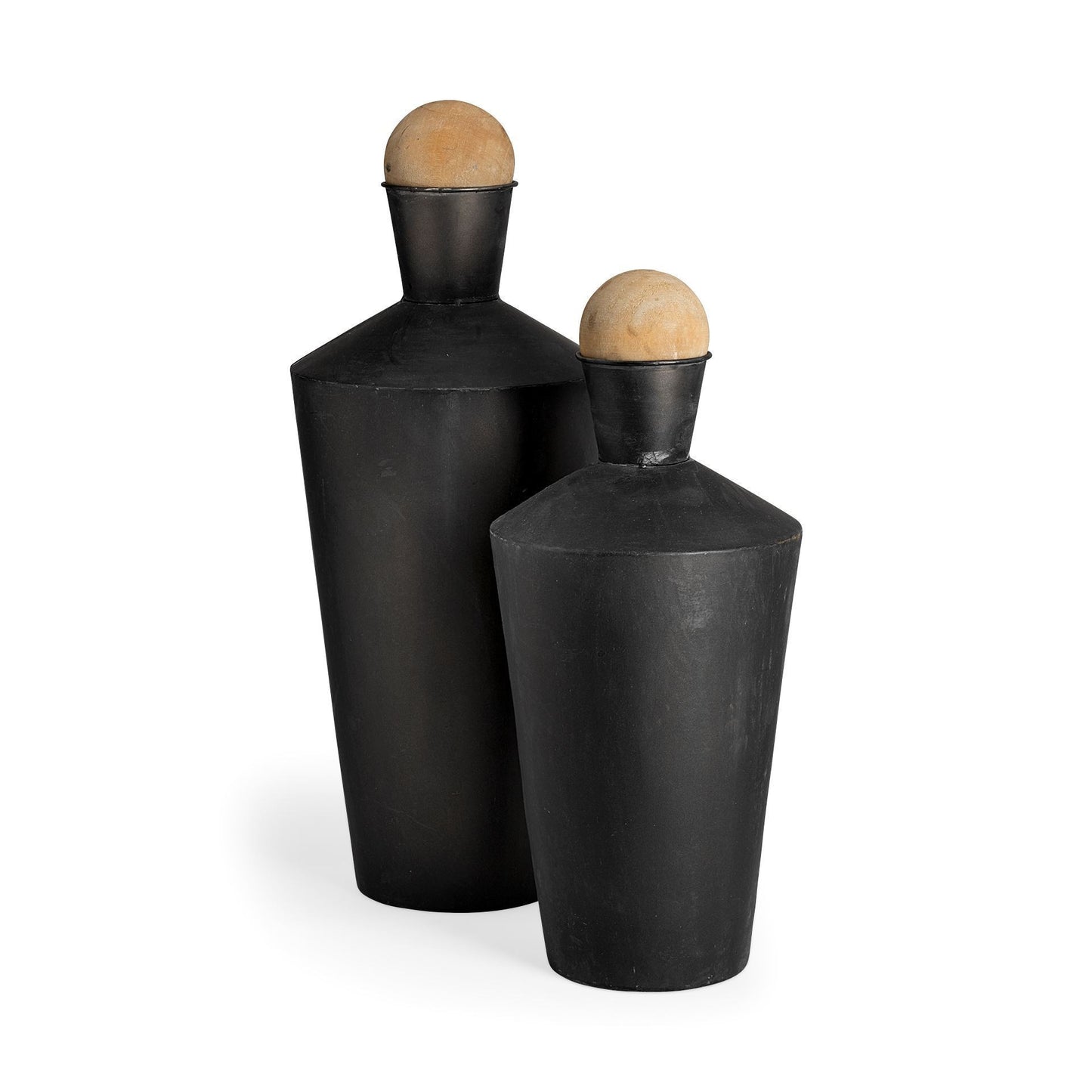 Set of three black cylindrical containers with wooden tops on a white background