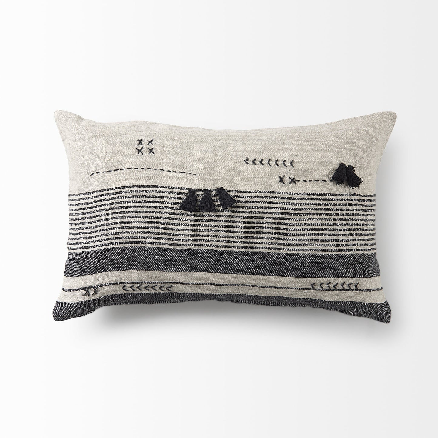 Decorative pillow with black and white patterns on a white background