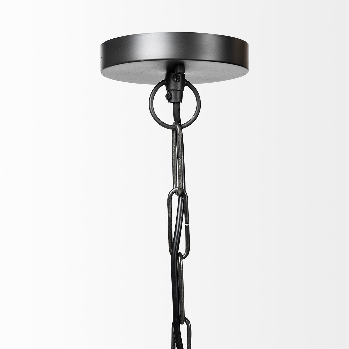 Black pendant light fixture on a white background