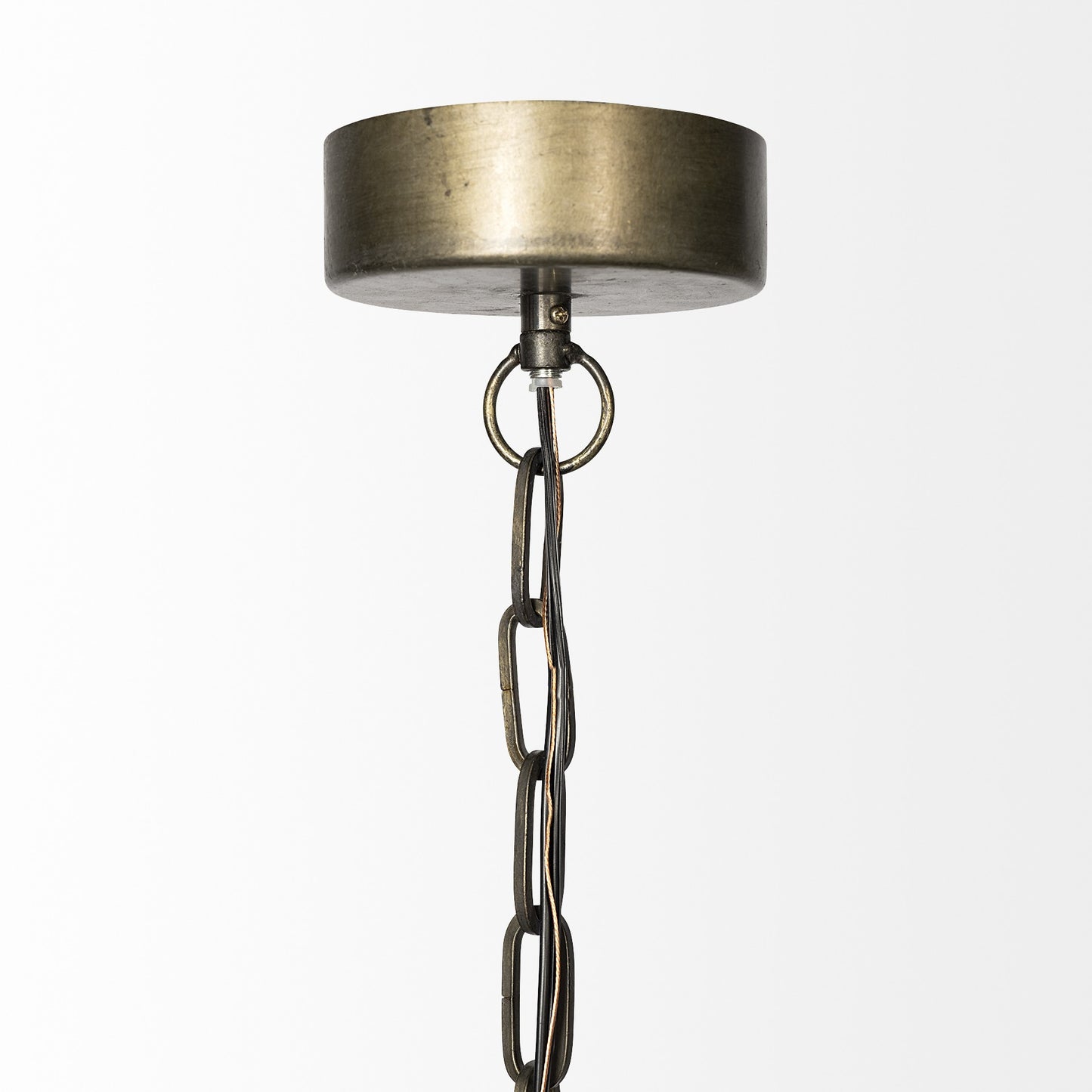 Metallic pendant light with chain on a white background