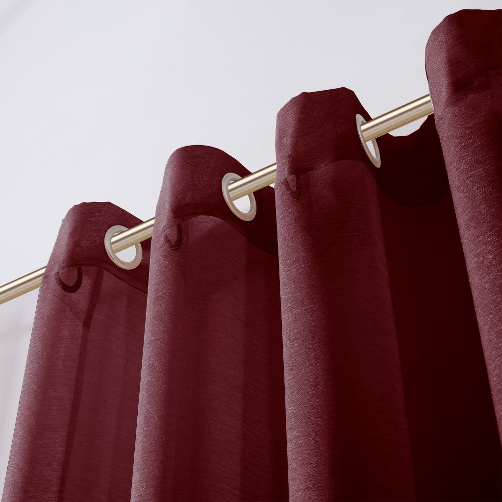 Maroon curtains with gold rings on a white background