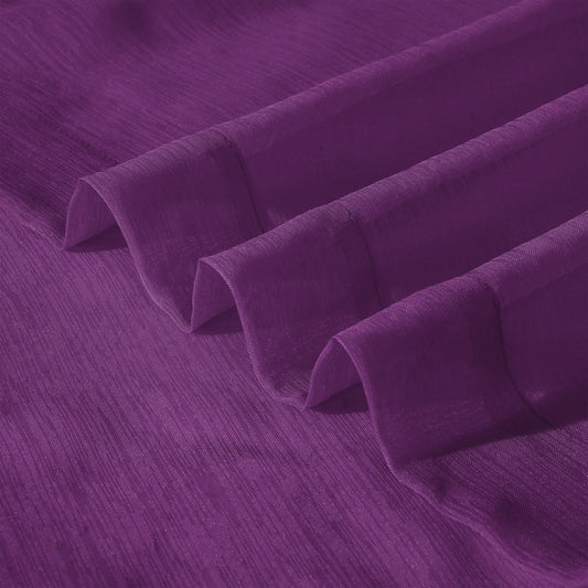 Close-up of purple fabric with a textured pattern