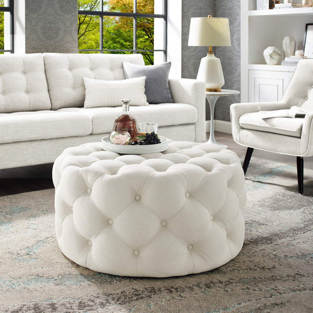 PALISADES WHITE LINEN TUFTED ROUND OTTOMAN