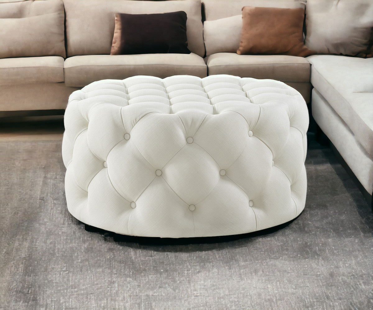 PALISADES WHITE LINEN TUFTED ROUND OTTOMAN