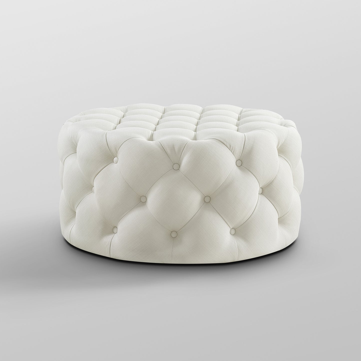 PALISADES WHITE LINEN TUFTED ROUND OTTOMAN