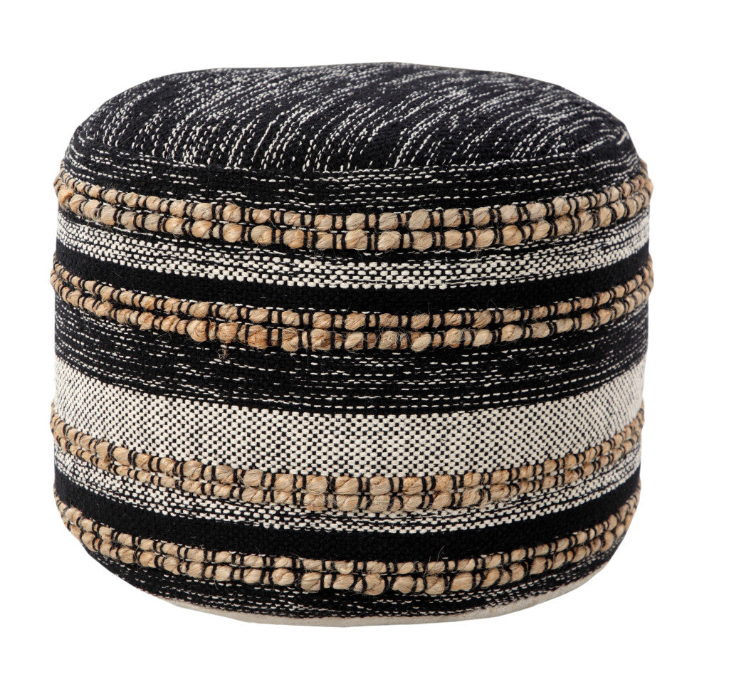 Round ottoman with striped pattern in black, beige, and white on a white background