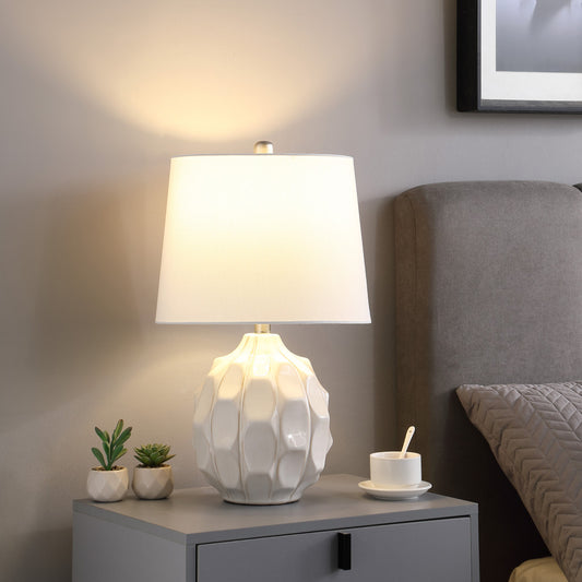 22" CREAM CERAMIC FACETED TABLE LAMP WITH OFF WHITE DRUM SHADE