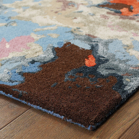 Multicolored abstract rug on a wooden floor