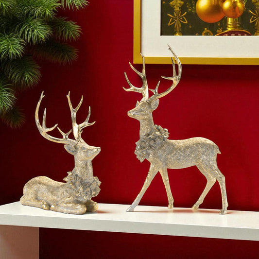 SET OF TWO GOLD AND GRAY REINDEER FIGURINES