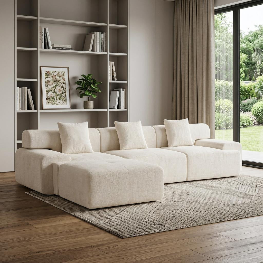 Beige chenille modular sofa with low arms and rolled back, an example of structured comfort seating from the Palisades fall collection