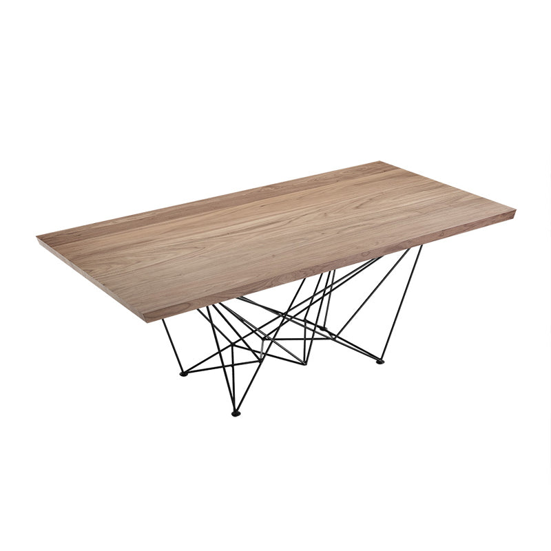 Wooden table with geometric metal legs on a white background