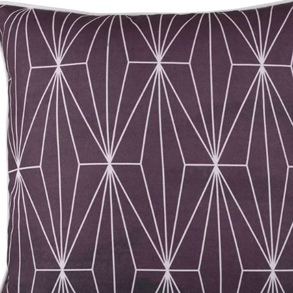 Purple pillow with white geometric pattern