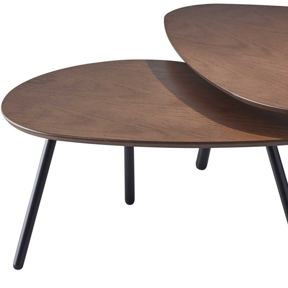Two wooden coffee tables with black legs on a white background