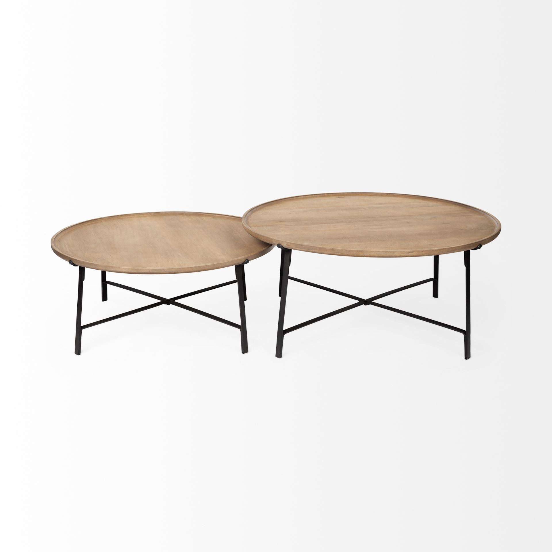 Two round wooden coffee tables with black metal legs on a white background
