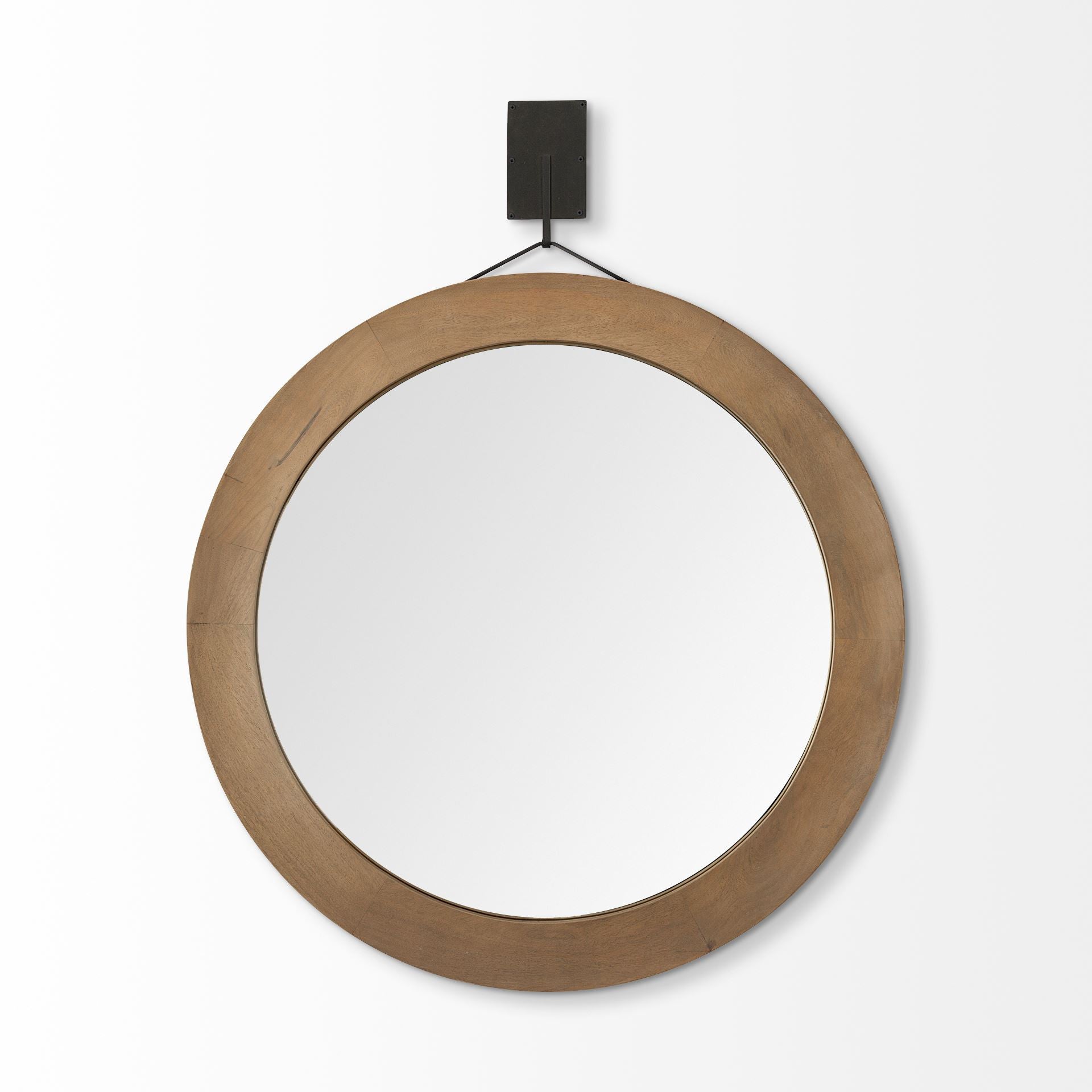 Round wooden mirror with a black hook on a white background