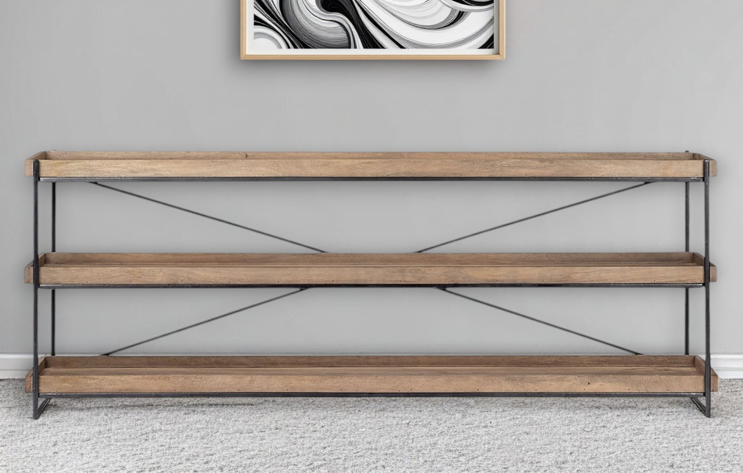 Wooden shelf with metal accents against a gray wall with abstract art.