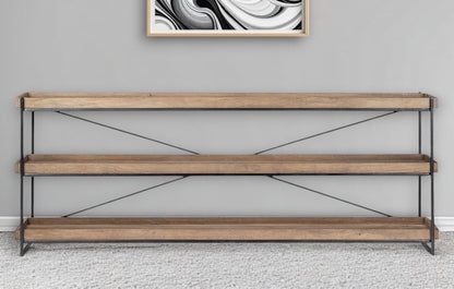 Wooden shelf with metal accents against a gray wall with abstract art.