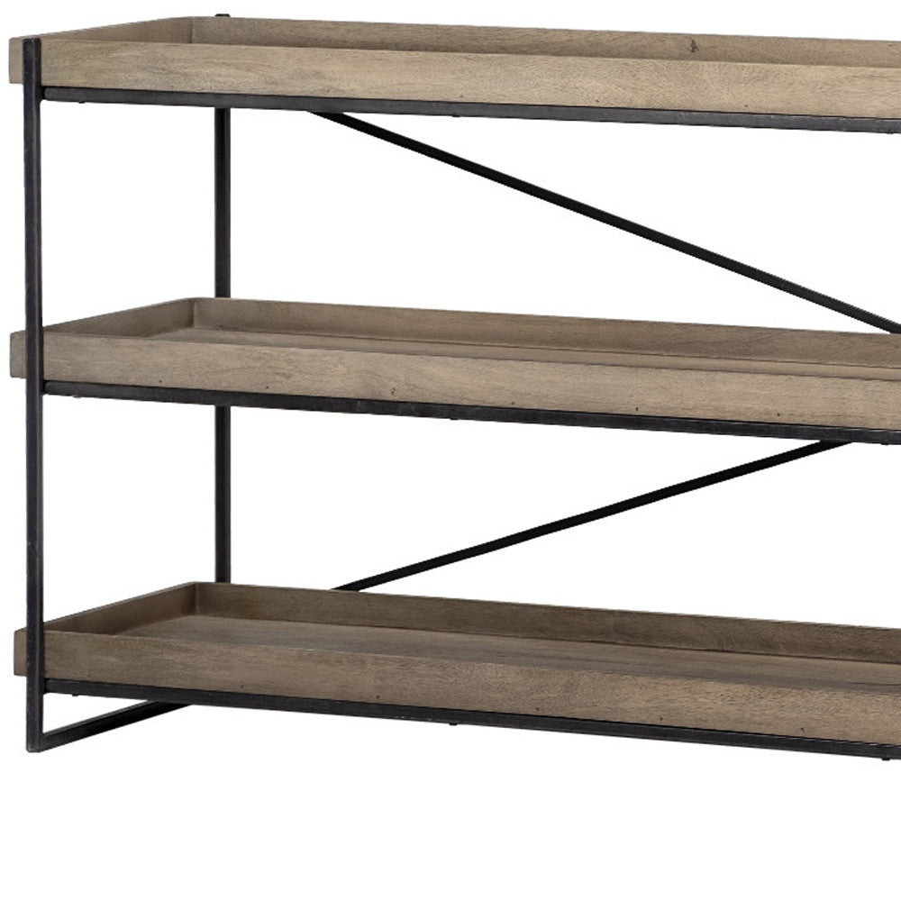 Three-tiered wooden shelf with metal brackets on a white background