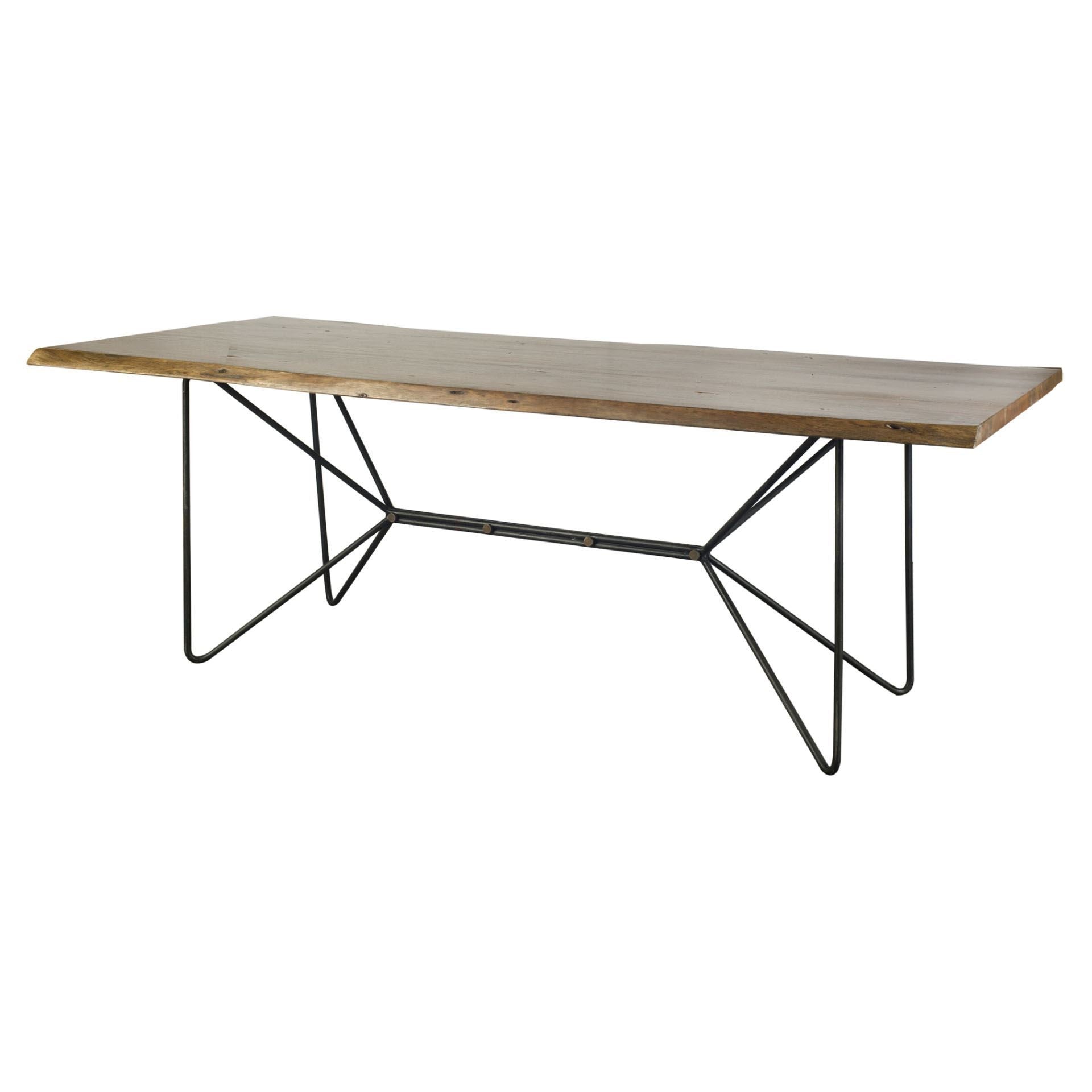 Rectangular table with wooden top and metal frame on a white background