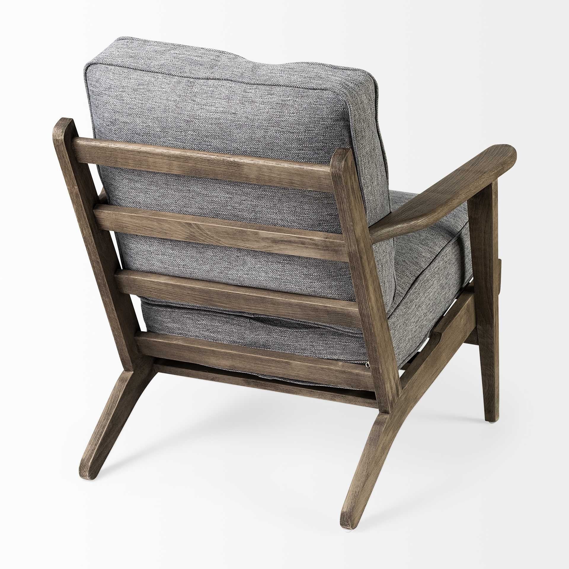 Gray cushioned armchair with wooden frame on a white background