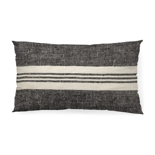 Black and white striped pillow on a white background