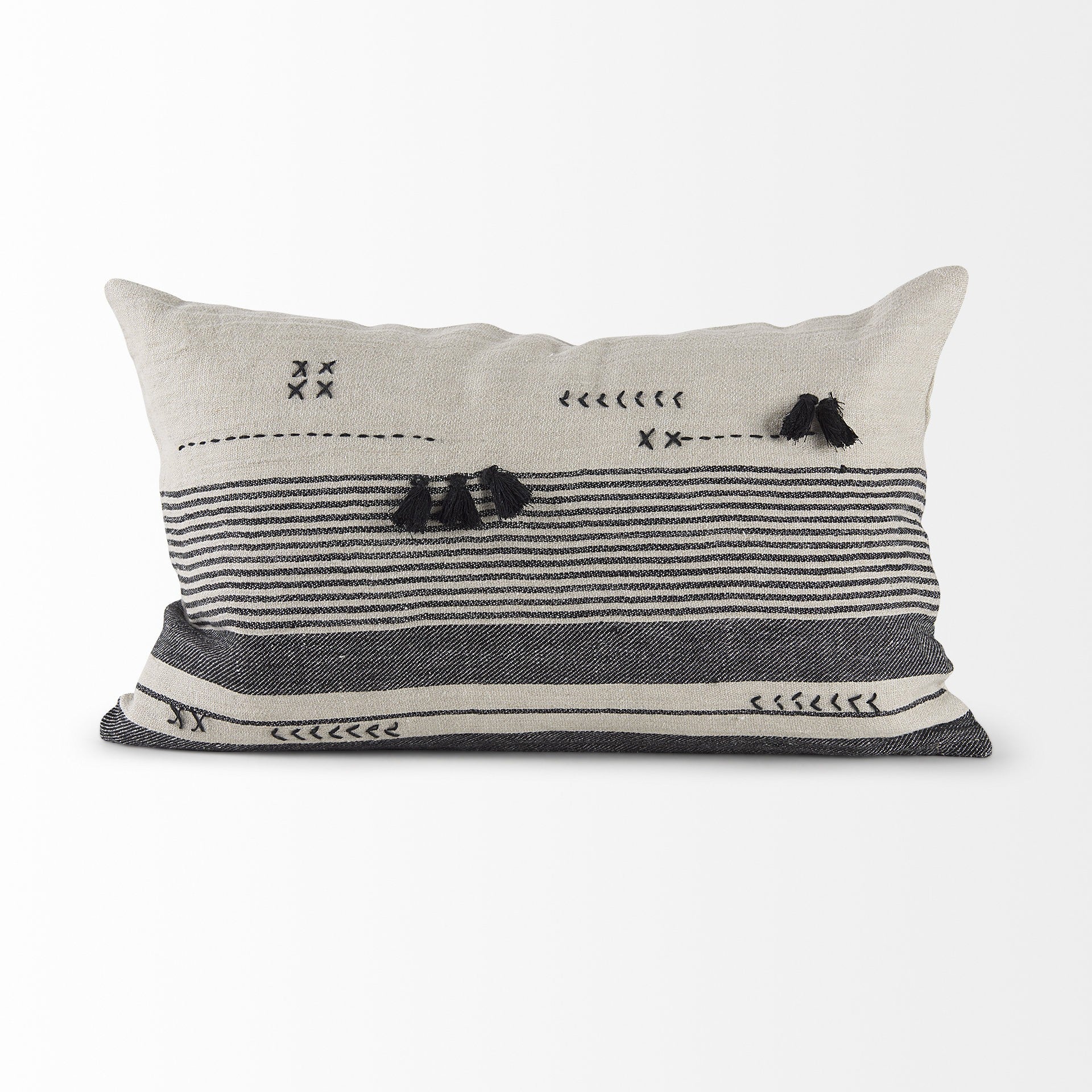 Decorative pillow with black and white patterns on a white background