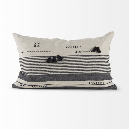 Decorative pillow with black and white patterns on a white background