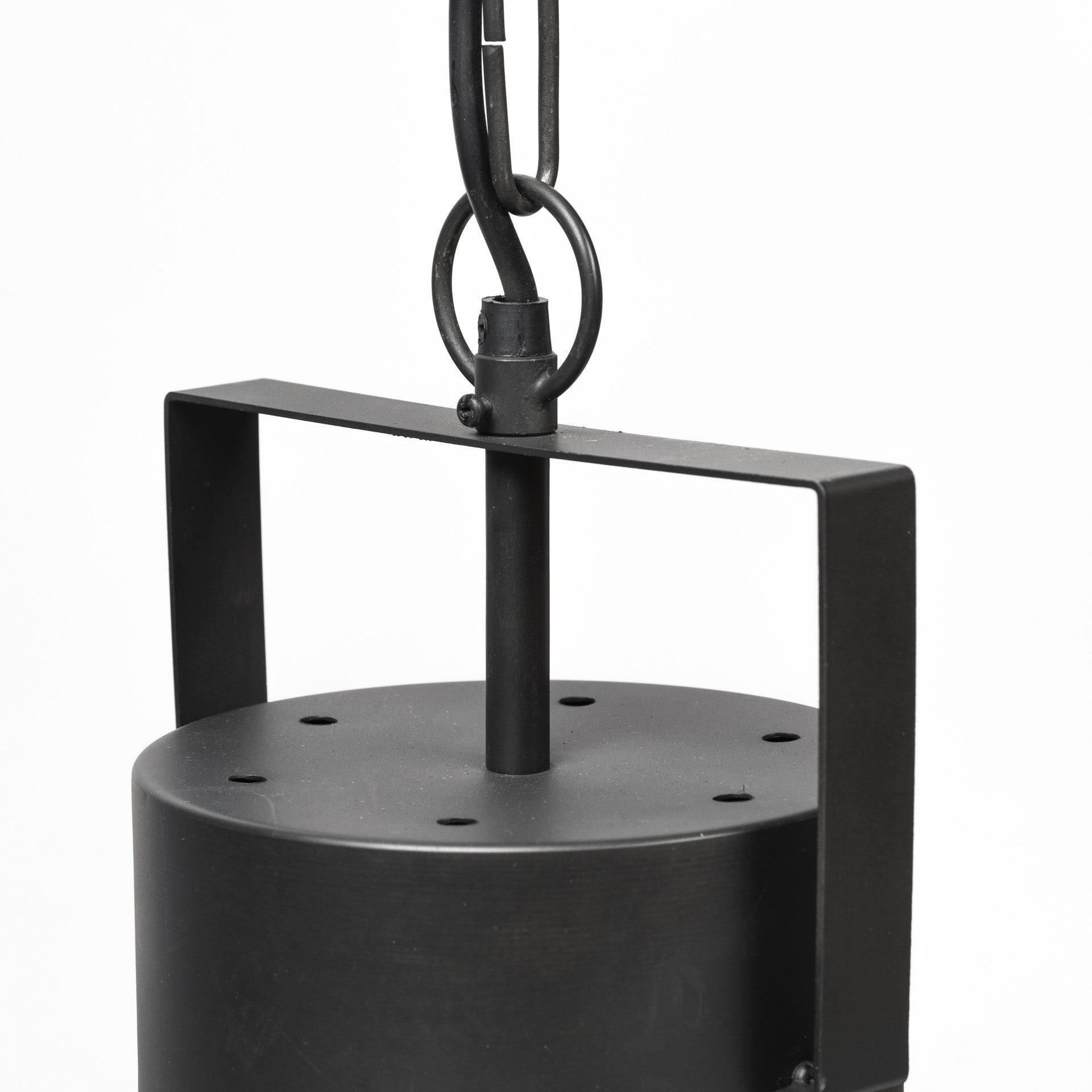 Black metal pendant light with chain on a white background