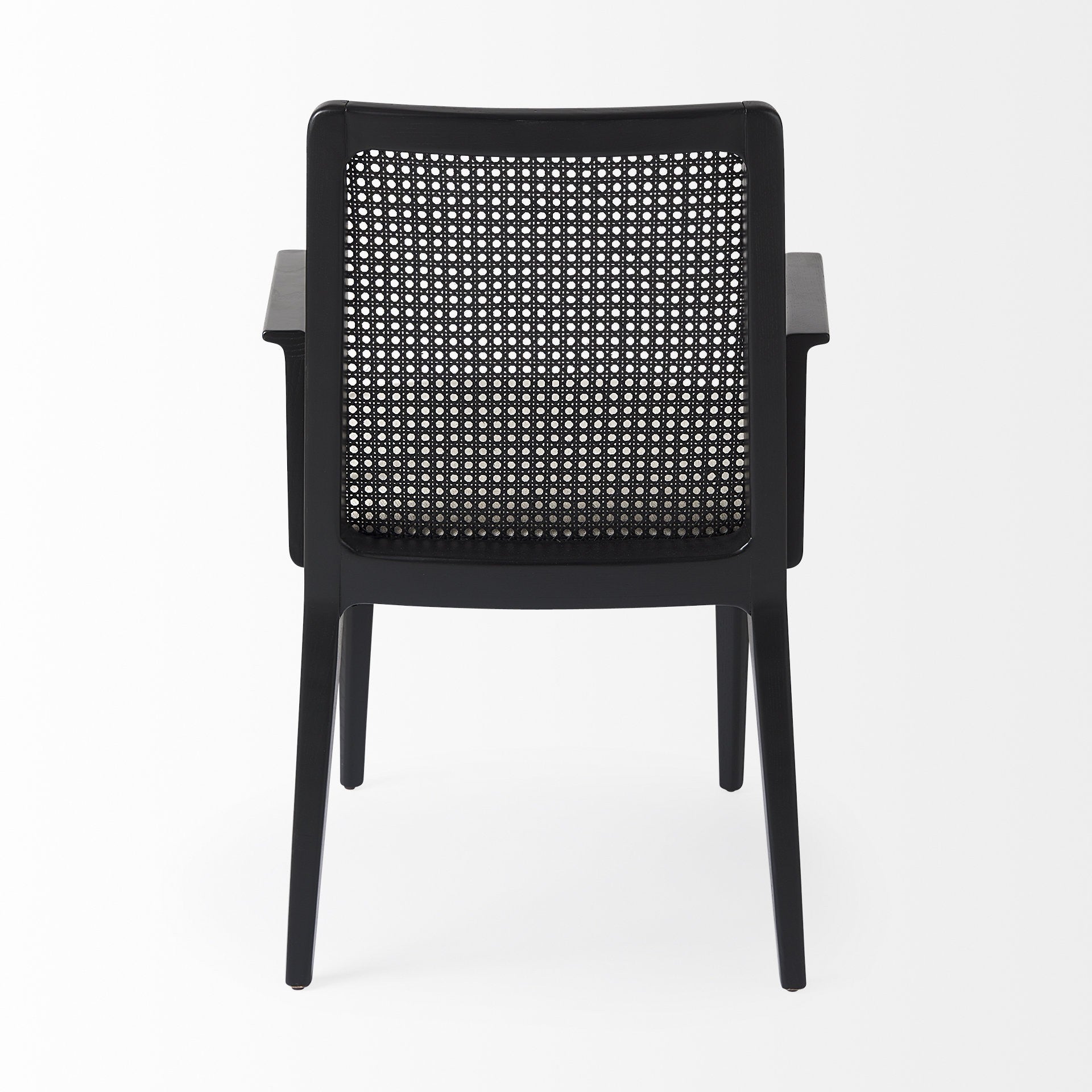 Black chair with woven backrest on a white background