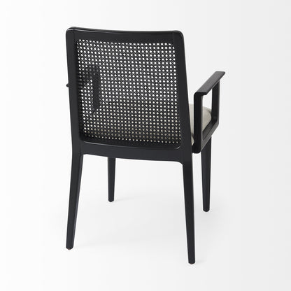 Black chair with woven backrest on a white background
