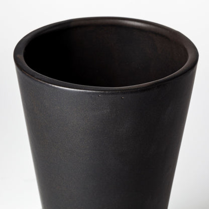 Black ceramic vase on a white background