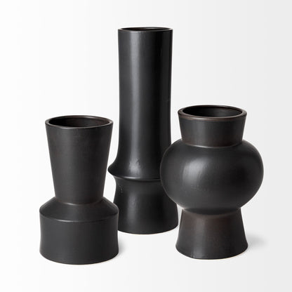 Three black vases of different shapes on a white background