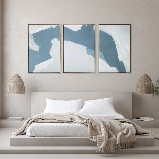 Bedroom with abstract wall art above a bed