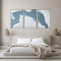 Bedroom with abstract wall art above a bed