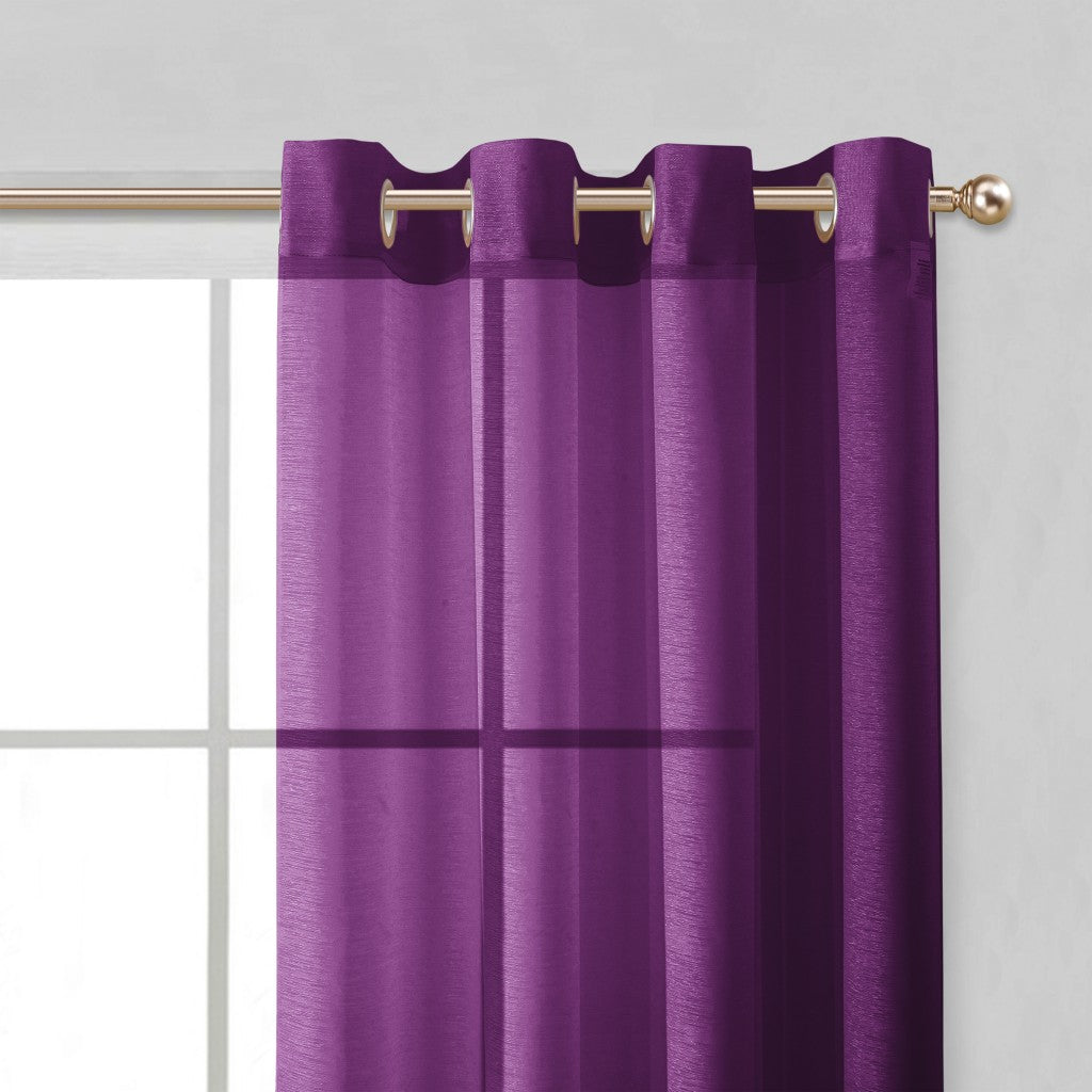 Purple curtain with grommets on a gray background