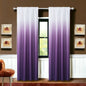 Gradient purple to white curtain hanging in a room with brown walls and framed pictures.