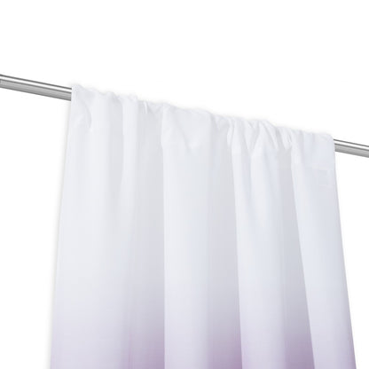 White curtain hanging on a rod against a white background