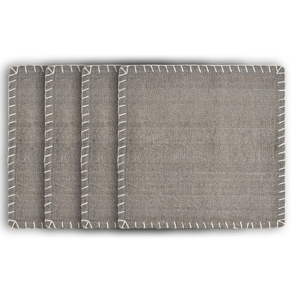 Gray fabric with white stitching on a white background