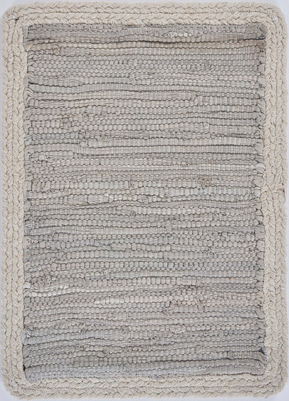 Textured gray rug on a white background