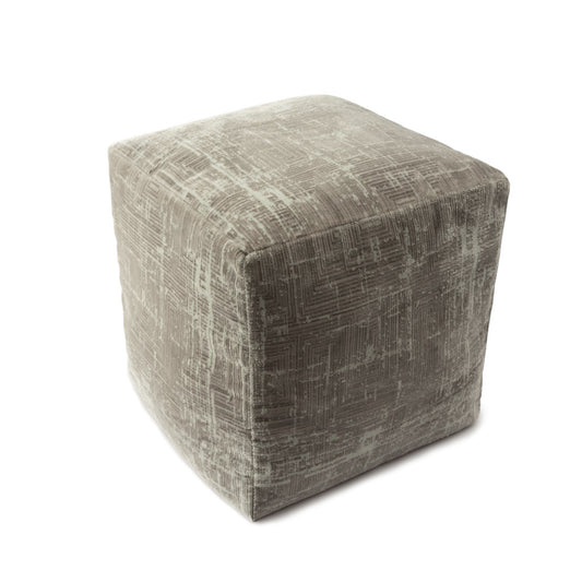 Textured cube-shaped ottoman on a white background