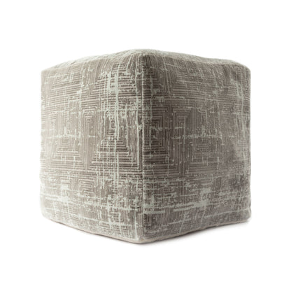 Textured cube-shaped ottoman on a white background