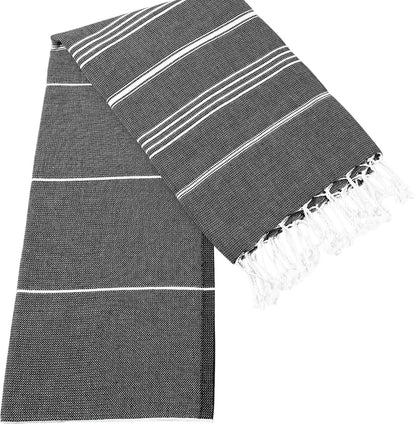 Gray towel with white stripes and fringes on a white background