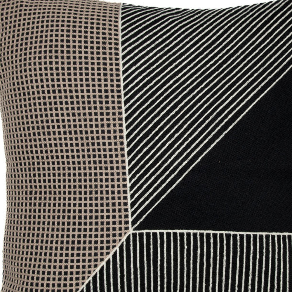 Textured fabric with checkered pattern on one side and striped pattern on the other, corner view.