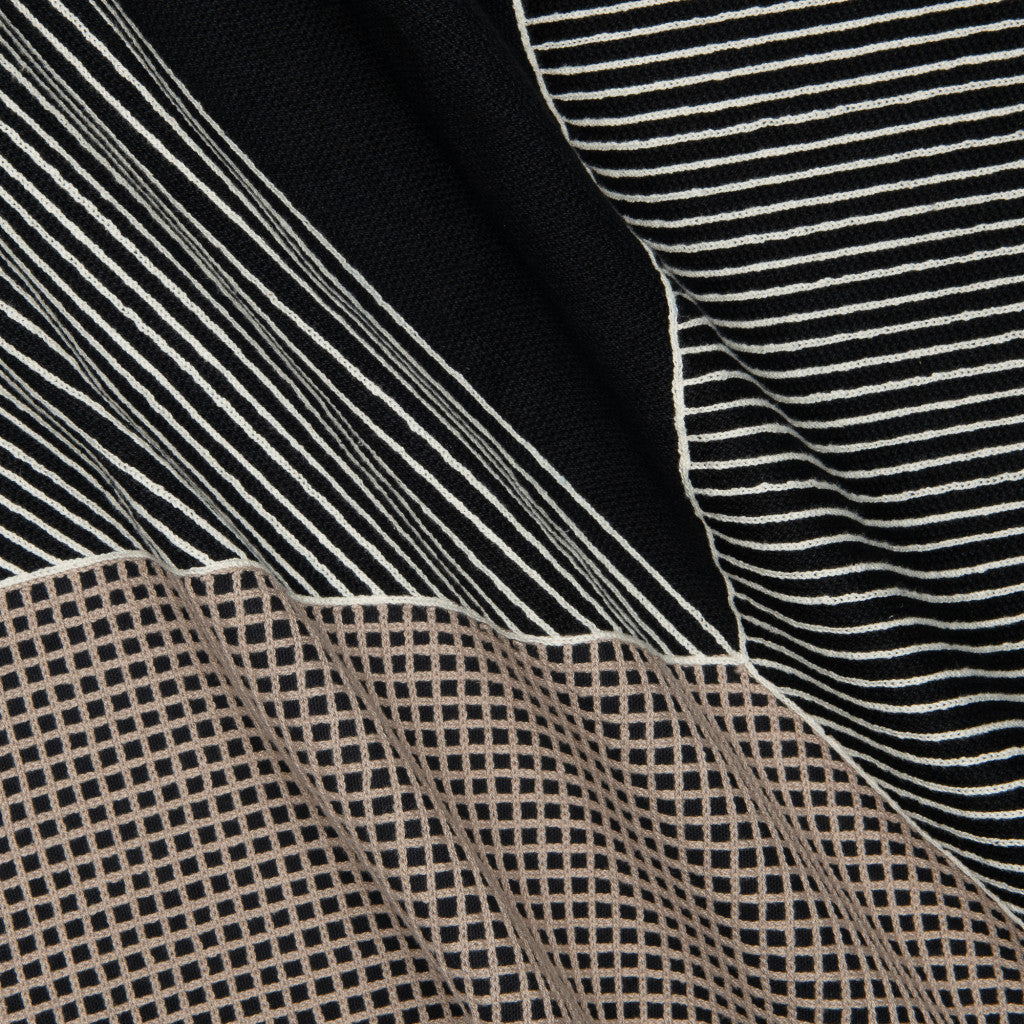 Close-up of fabric with black and white striped pattern
